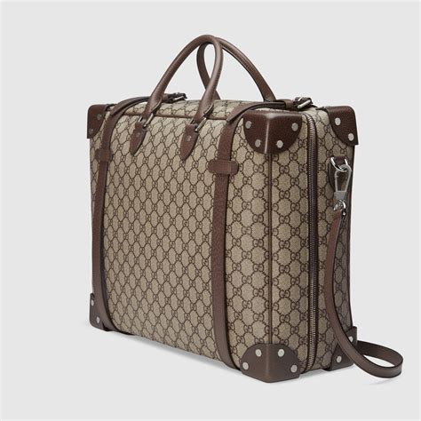 berretta di gucci|Gucci leather suitcase.